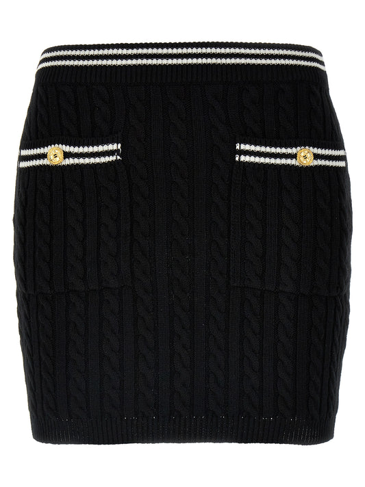 Skirt by Alessandra Rich for women in cotton bicolour, black & white features a contoured silhouette from the Women's Cotton Mini Long Skirt collection, characterized by its contoured mini long for a contoured finish.