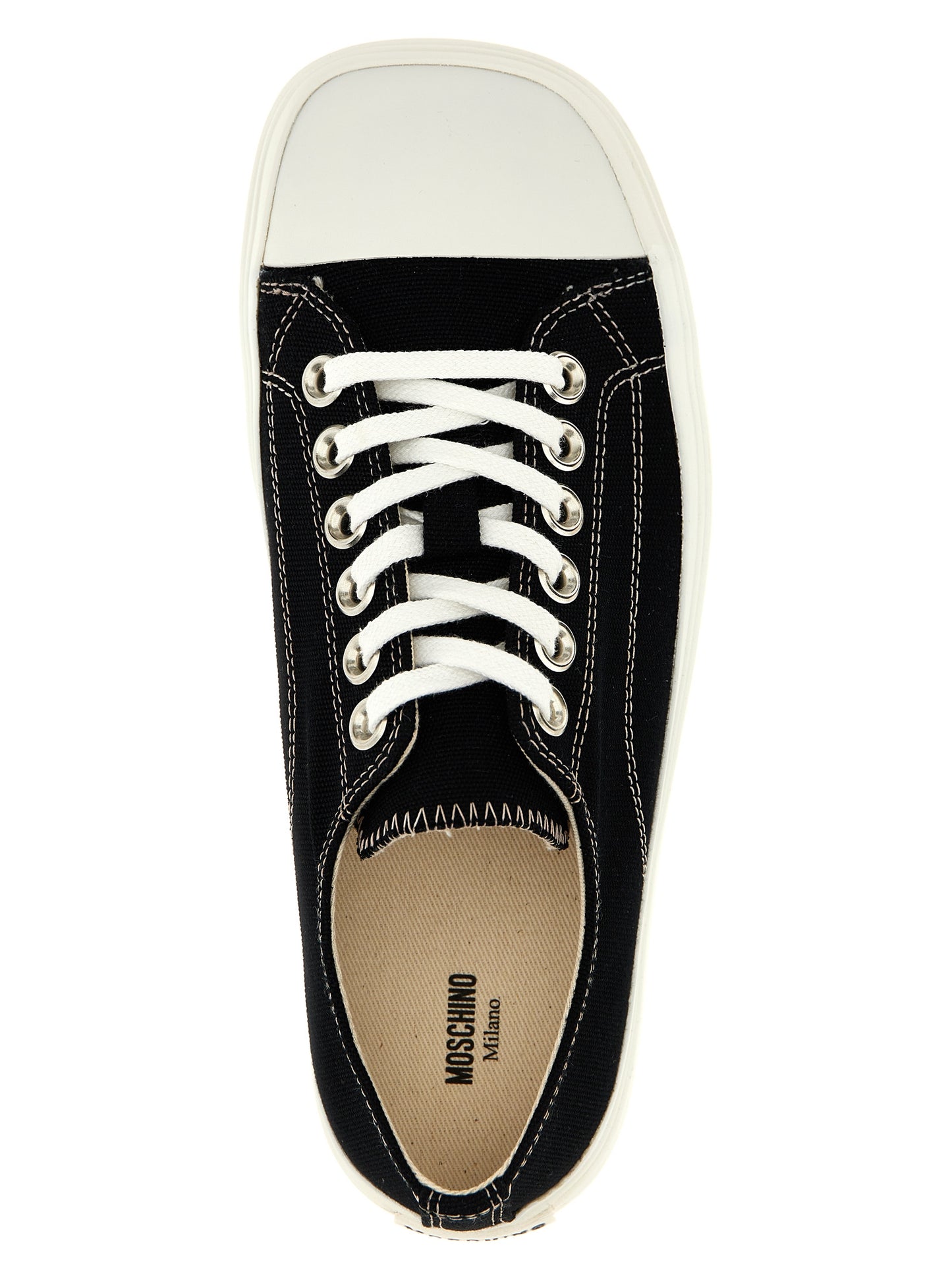 Sneakers by Moschino for women in cotton canvas black presents a sumptuous silhouette, artfully capturing the essence of the Women's Low Top Cotton Canvas Sneakers with its sumptuous low-top style design.