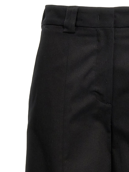 Trousers by THELATEST for women in stretch cotton black presents a smart silhouette, meticulously detailed with a smart straight-leg & wide, a smart long, and a smart .
