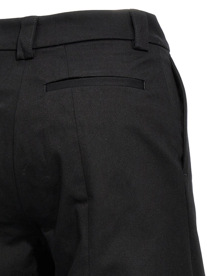 Trousers by THELATEST for women in stretch cotton black features a tailored silhouette with a tailored straight-leg & wide, defined by its long and a sophisticated .