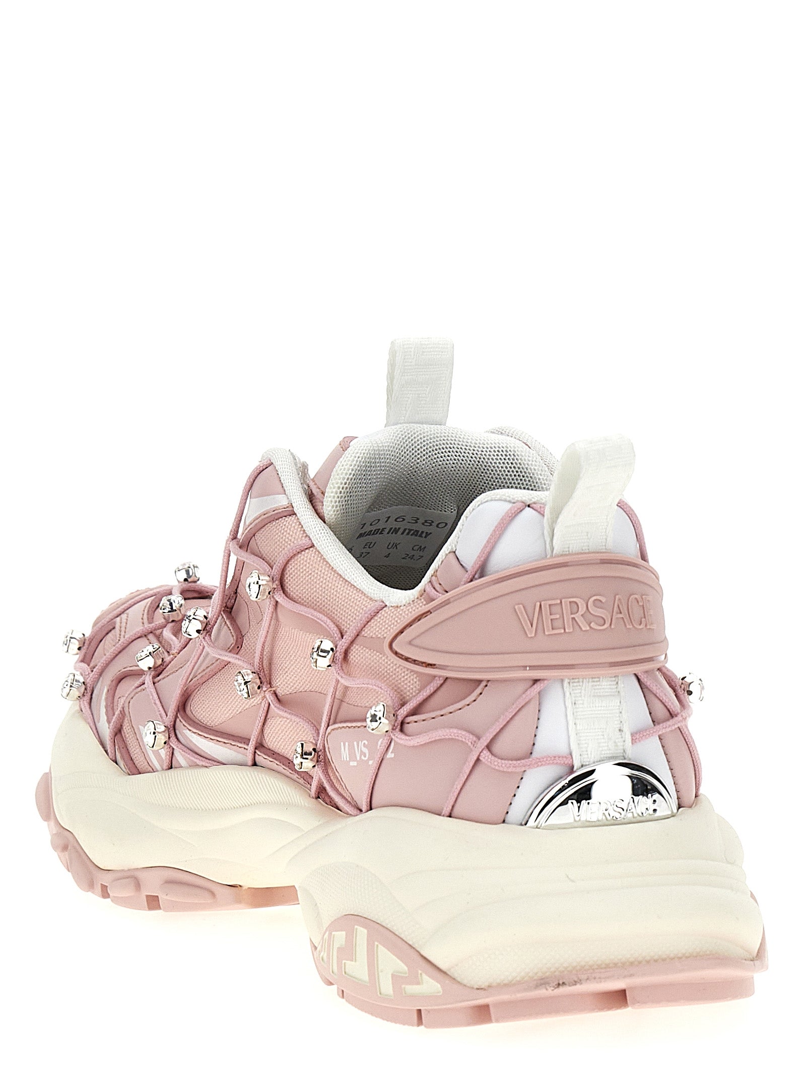 Athletic Sneakers by Versace for women in eva polyester & crystal multicolor & pink showcases a architectural silhouette, artfully capturing the essence of the Women's Athletic EVA Polyester & Crystal Sneakers with its signature architectural athletic style construction.