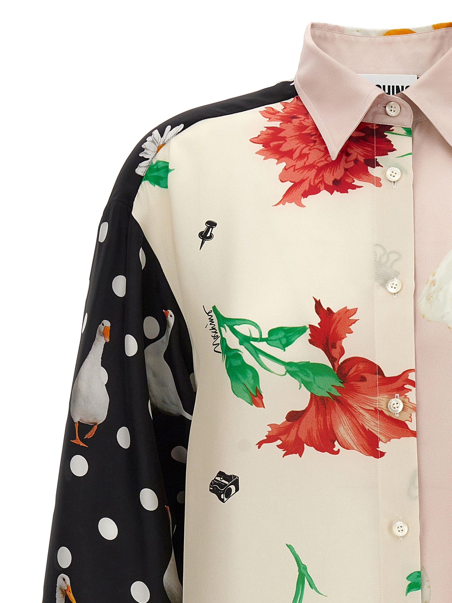 Blouse by Moschino for women in silk multicolor, print & patchwork showcases a sharp silhouette, elegantly detailed with a sharp and sharp .