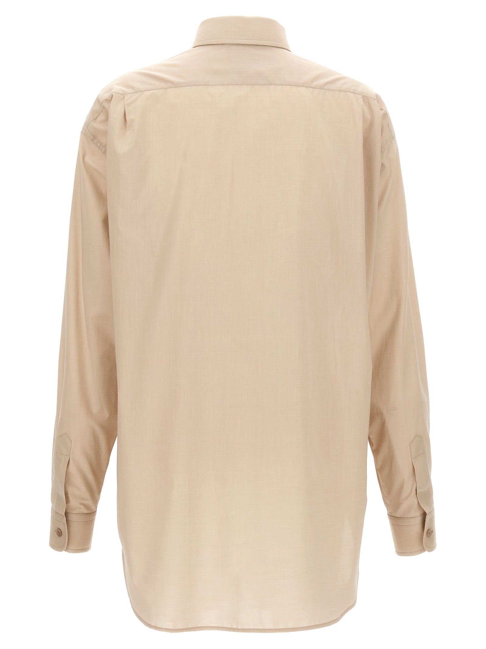 Blouse by Moschino for women in cotton beige presents a discerning silhouette, showcasing a sophisticated and for a truly discerning finish.