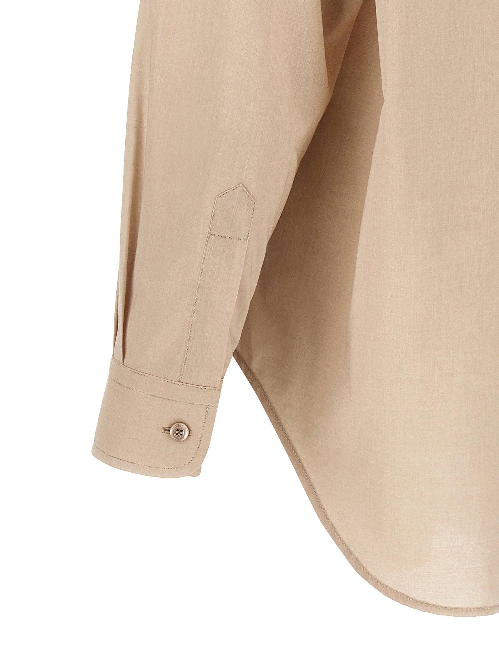 Blouse by Moschino for women in cotton beige features an polished silhouette, showcasing a sophisticated and detail for a truly polished finish.