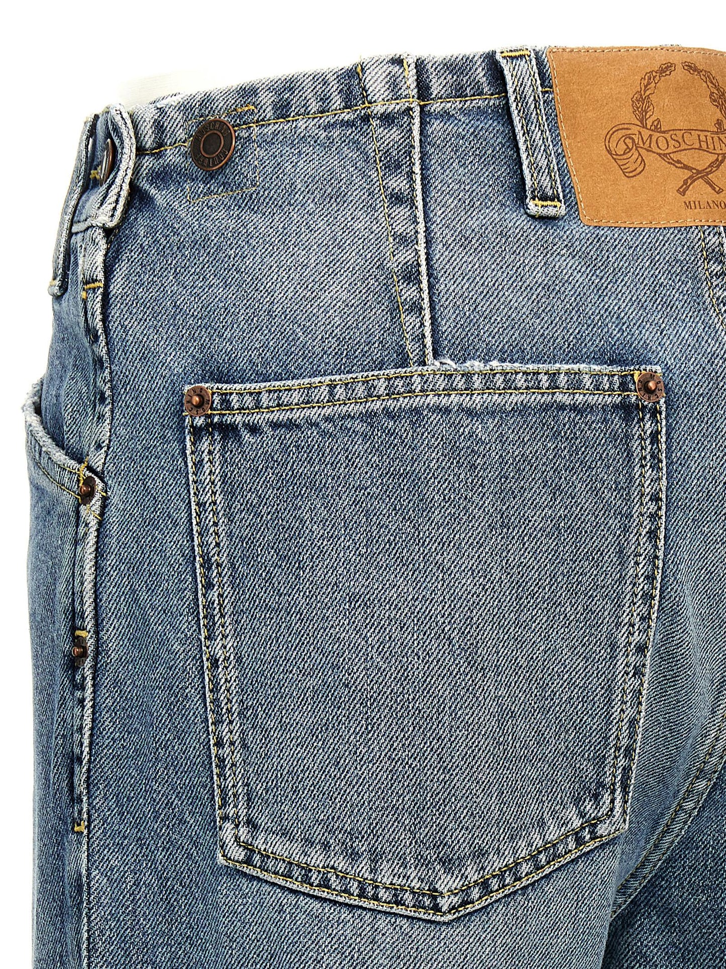 Jeans by Moschino for women in denim cotton blue & signature features a refined silhouette with a refined straight-leg, defined by a mid rise and a refined long for a refined finish.