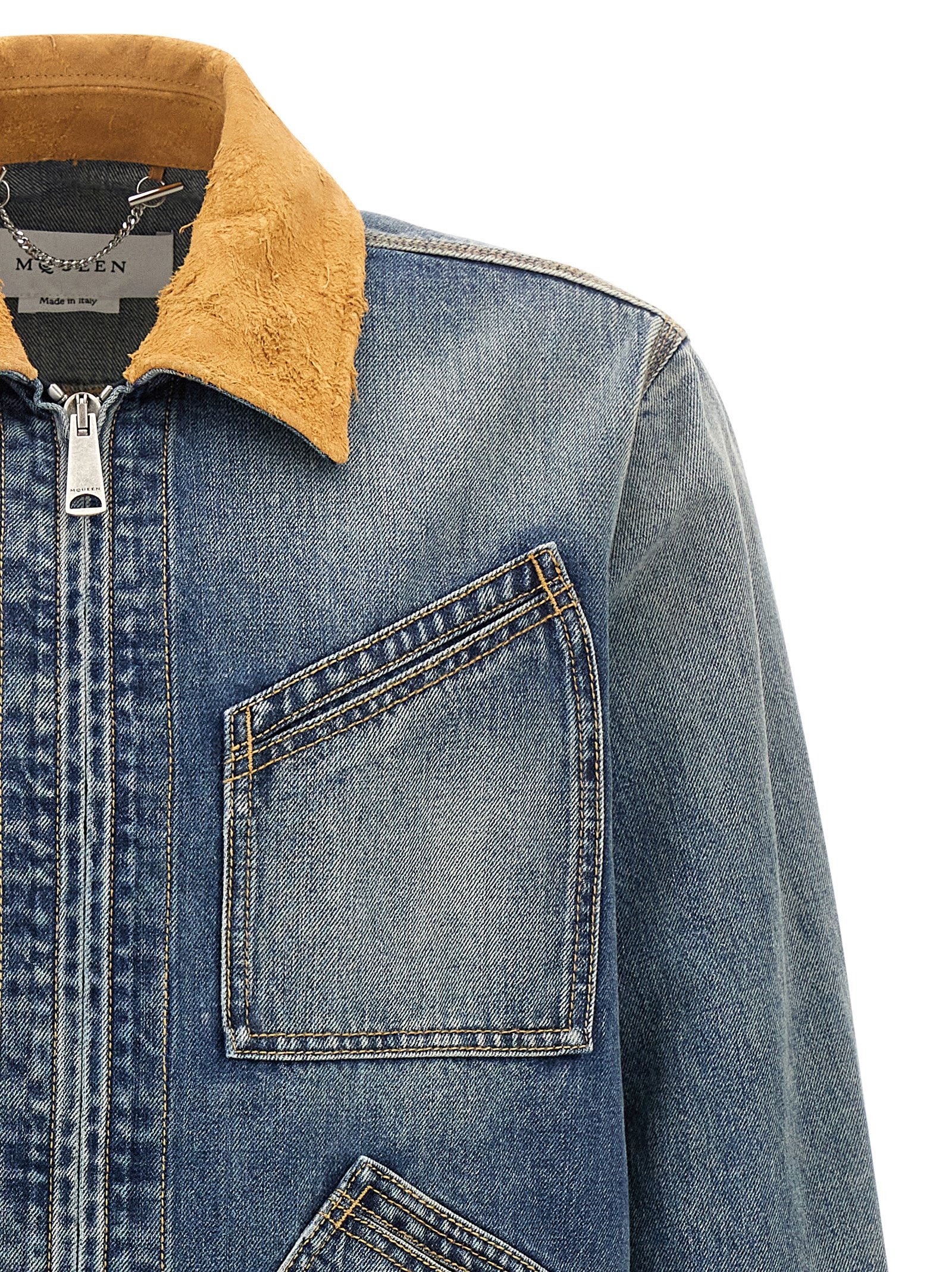 Trucker Jacket by Alexander McQueen for men in denim cotton & suede leather blue features a dramatic silhouette, showcasing a sophisticated and distinctive pockets for a dramatic aesthetic.
