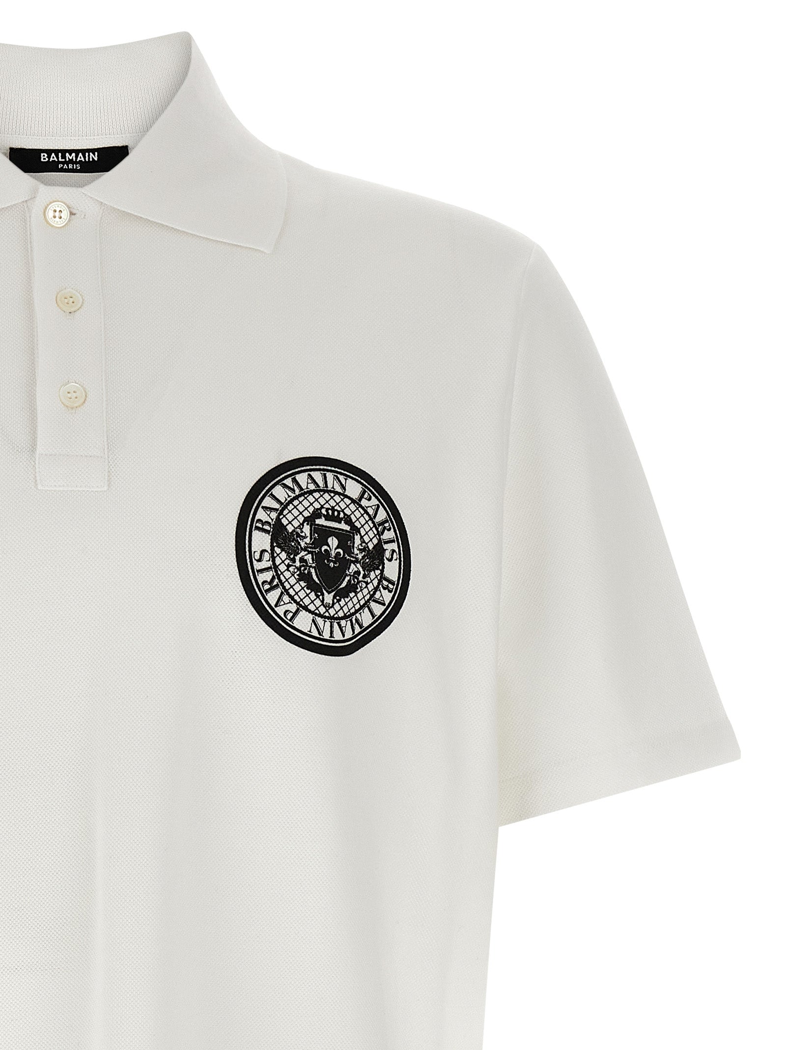 Polo Shirt by Balmain for men in cotton bicolour, black, white & print presents a sleek silhouette, featuring a refined and for a sleek finish.