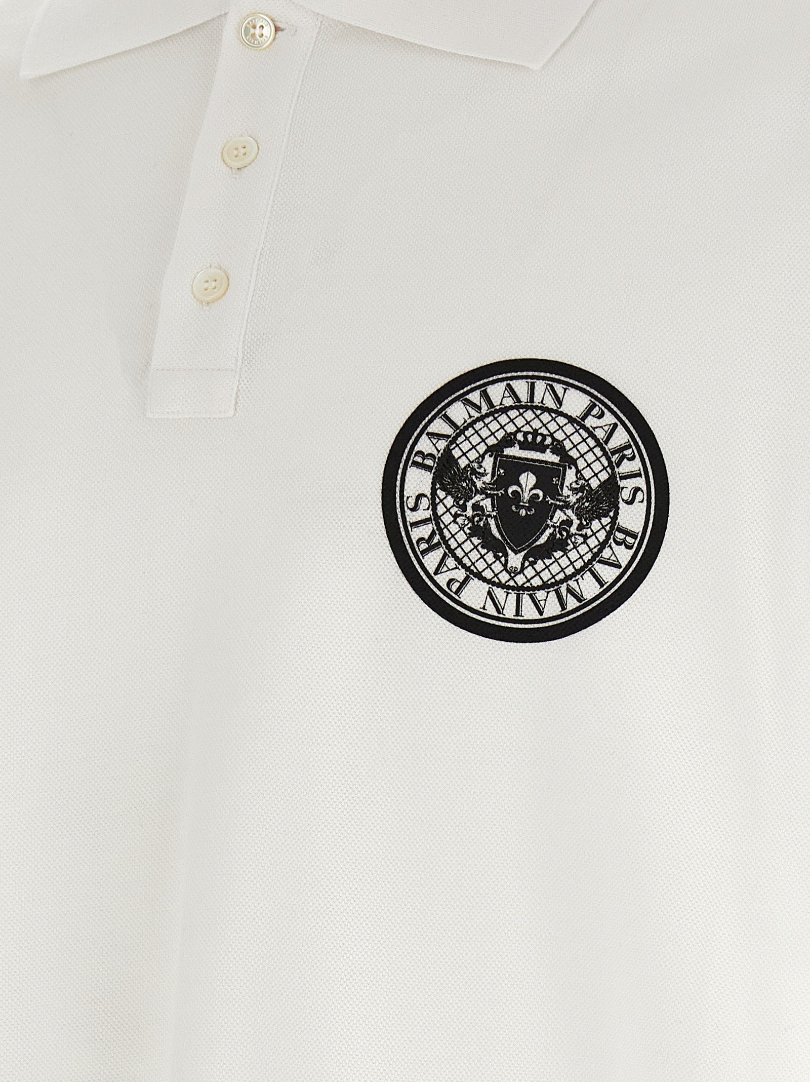 Polo Shirt by Balmain for men in cotton bicolour, black, white & print features a eye catching silhouette, showcasing a refined and for a eye catching finish.