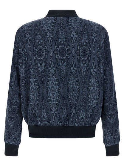 This Bomber Jacket by Etro for men in polyamide polyester viscose & cotton blue & jacquard exhibits a edgy silhouette, meticulously detailed with functional pockets and a edgy for a edgy finish.