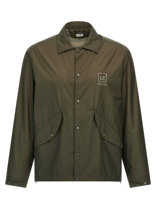 Overshirt by C.P. Company for men in polyamide bicolour & green showcases a sleek silhouette, elegantly detailed with a sleek and for a sleek finish.