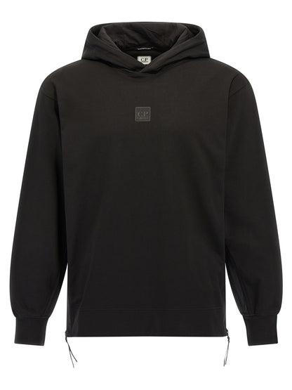 Sweatshirt Hoodie by C.P. Company for men in stretch cotton black features a slouchy chic silhouette, detailed with a slouchy chic and a signature hooded neckline for an elevated aesthetic.