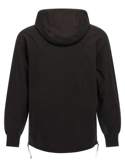 Sweatshirt Hoodie by C.P. Company for men in stretch cotton black features a authentic silhouette, showcasing a sophisticated hooded neckline and authentic detail for a refined finish.