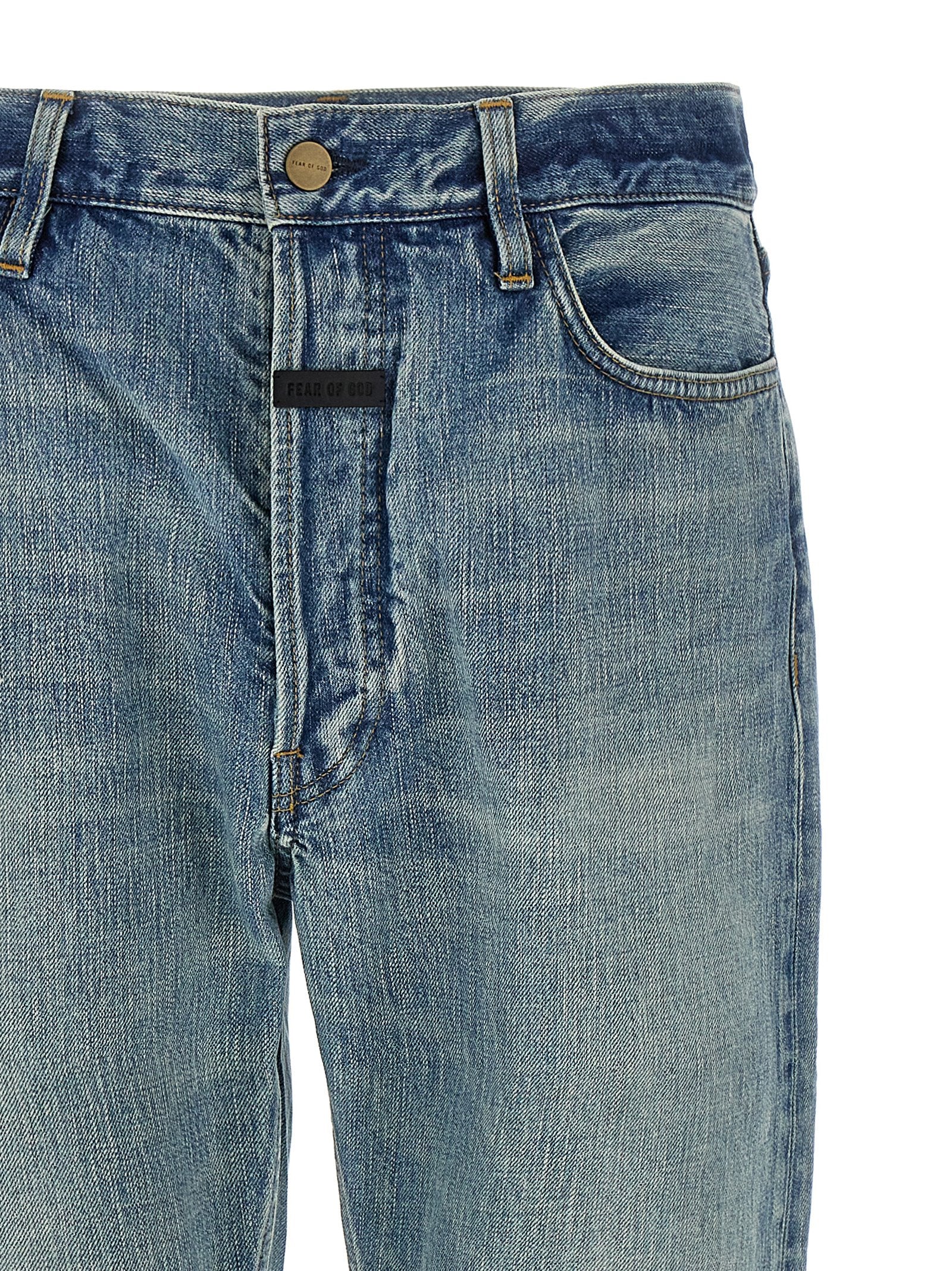 Jeans by Fear Of God for men in cotton denim blue presents a tailored silhouette, showcasing a tailored straight-leg and long cut with a refined for a truly tailored aesthetic.