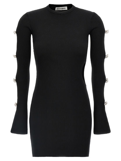 Dress by MACH & MACH for women in viscose polyester & rhinestone black features a dramatic silhouette, showcasing an elegant crew neckline and long-sleeve that flows into a dramatic short mini.