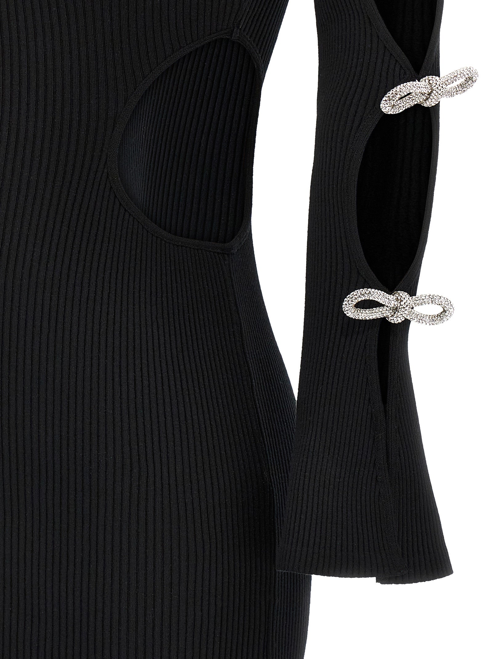 Dress by MACH & MACH for women in viscose polyester & rhinestone black features a dramatic silhouette, showcasing an elegant and that flows into a dramatic short mini.