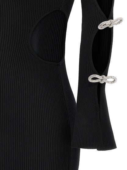 Dress by MACH & MACH for women in viscose polyester & rhinestone black features a dramatic silhouette, showcasing an elegant and that flows into a dramatic short mini.
