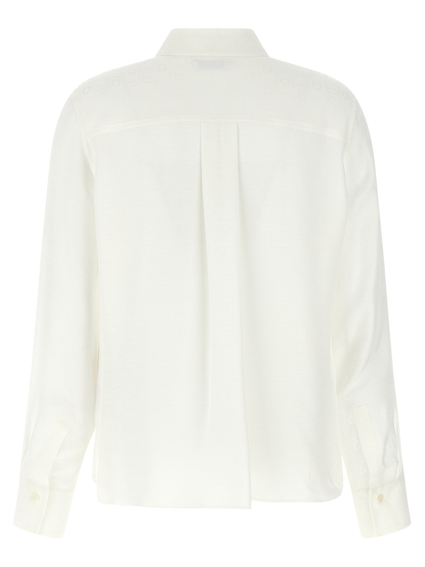 Blouse by Ferragamo for women in silk white, jacquard & monogram showcases a sublime silhouette, artfully detailed with a sublime and for a sophisticated, sublime finish.