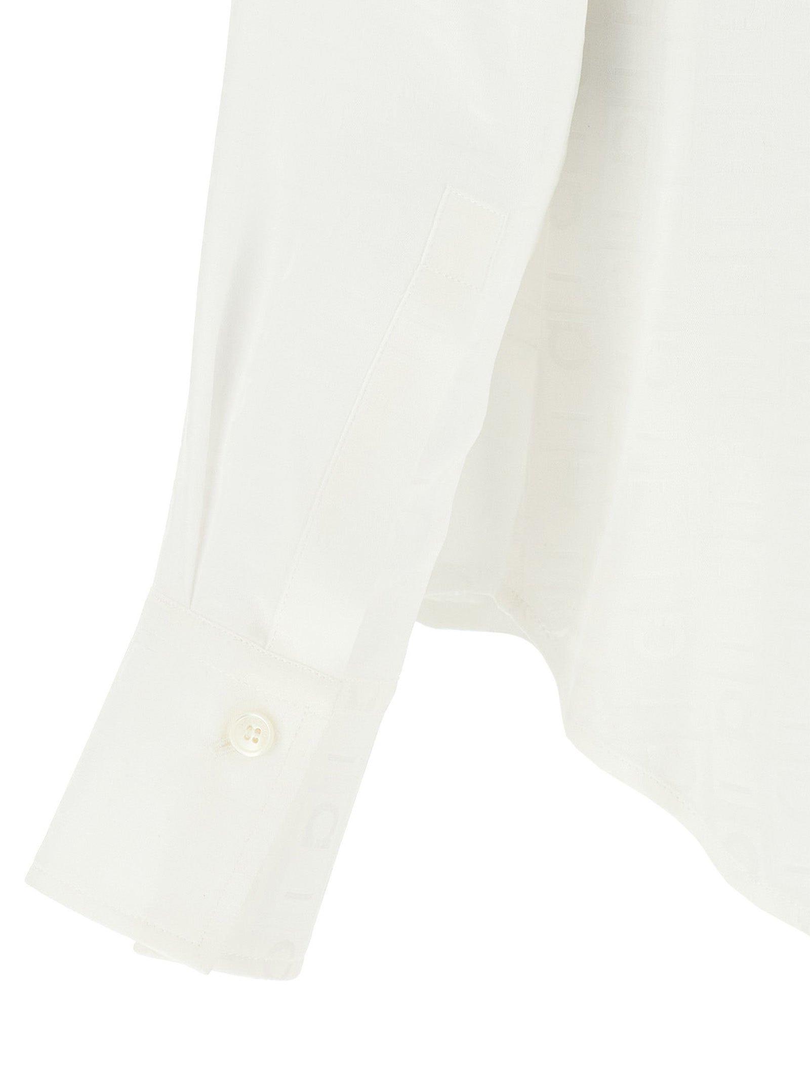 Blouse by Ferragamo for women in silk white, jacquard & monogram showcases a sharp silhouette, elegantly detailed with a sharp and sharp .