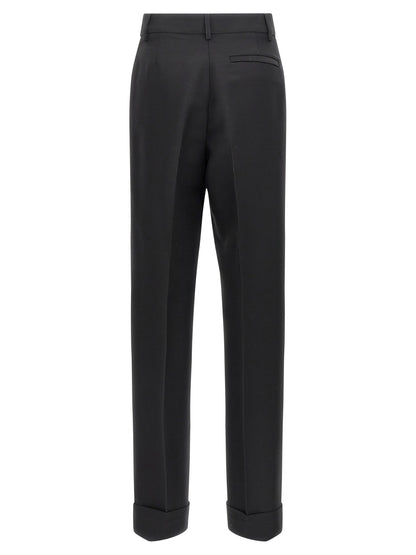 Trousers by Ferragamo for women in viscose & virgin wool black features a tailored silhouette with a tailored straight-leg, defined by its long and a sophisticated .