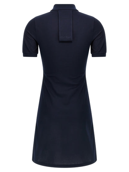 Dress by Courrèges for women in cotton blue showcases a striking silhouette, elegantly detailed with a , refined , and a striking short mini for a striking finish.