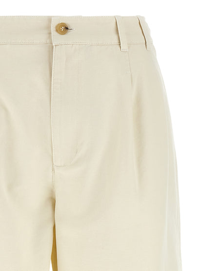 Casual Pants by A.P.C. for women in cotton beige features a polished silhouette with a polished straight-leg, reaching a polished long and finished with a polished high rise.