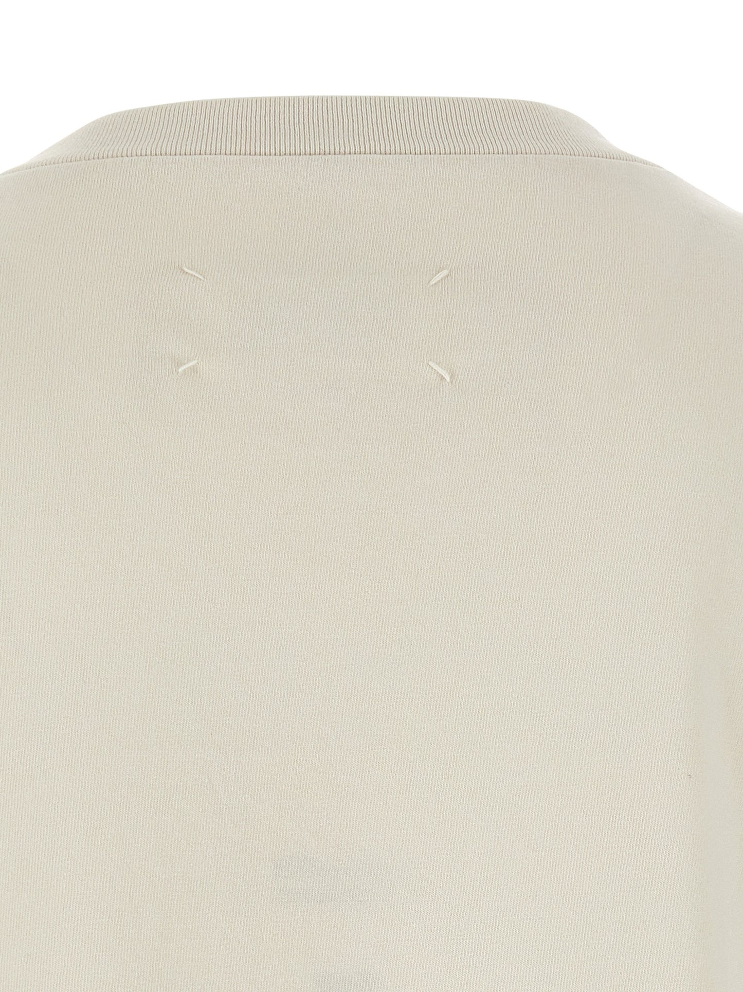 T-Shirt by Maison Margiela for men in cotton beige & print showcases a fashionable silhouette, elegantly detailed with a fashionable and for a sophisticated, high-fashion look.