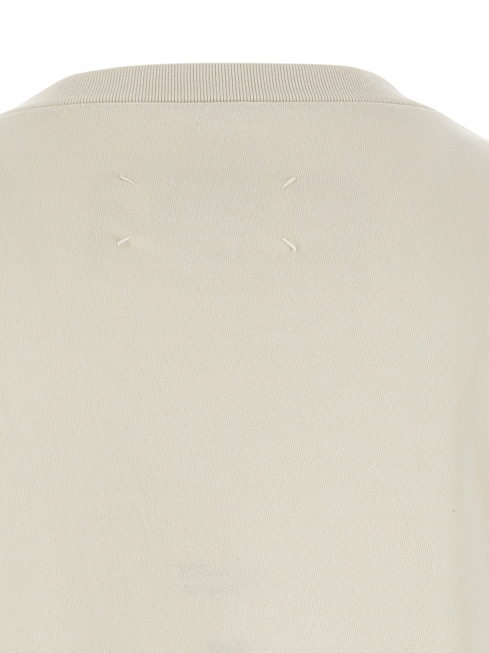 T-Shirt by Maison Margiela for men in cotton beige & print showcases a fashionable silhouette, elegantly detailed with a fashionable and for a sophisticated, high-fashion look.