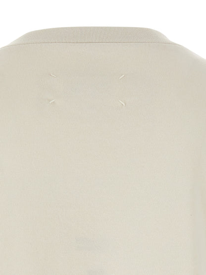 T-Shirt by Maison Margiela for men in cotton beige & print showcases a fashionable silhouette, elegantly detailed with a fashionable and for a sophisticated, high-fashion look.