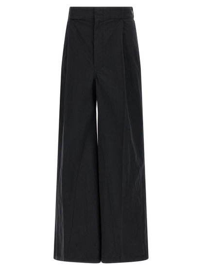 Trousers by Maison Margiela for women in polyamide cotton black & signature features an sartorial silhouette, showcasing a precise straight-leg & wide and long with a sartorial for a refined look.