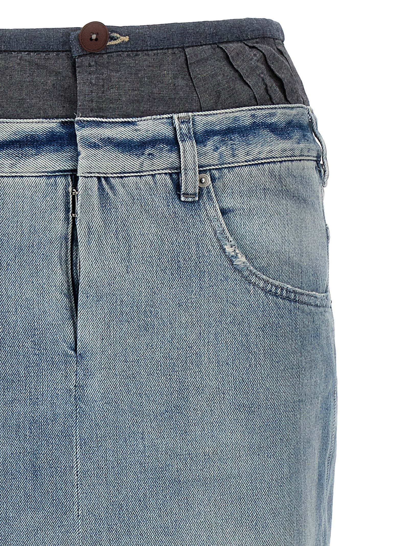 Skirt by Maison Margiela for women in denim cotton multicolor showcases a dramatic silhouette, artfully capturing the essence of the Women's Denim Layered Cotton Mini Skirt in a dramatic mini cut for a refined look.