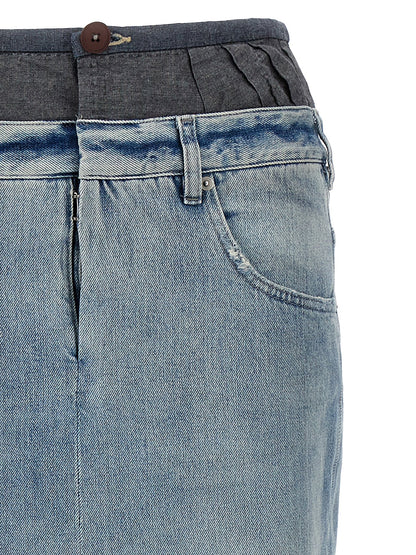 Skirt by Maison Margiela for women in denim cotton multicolor showcases a dramatic silhouette, artfully capturing the essence of the Women's Denim Layered Cotton Mini Skirt in a dramatic mini cut for a refined look.