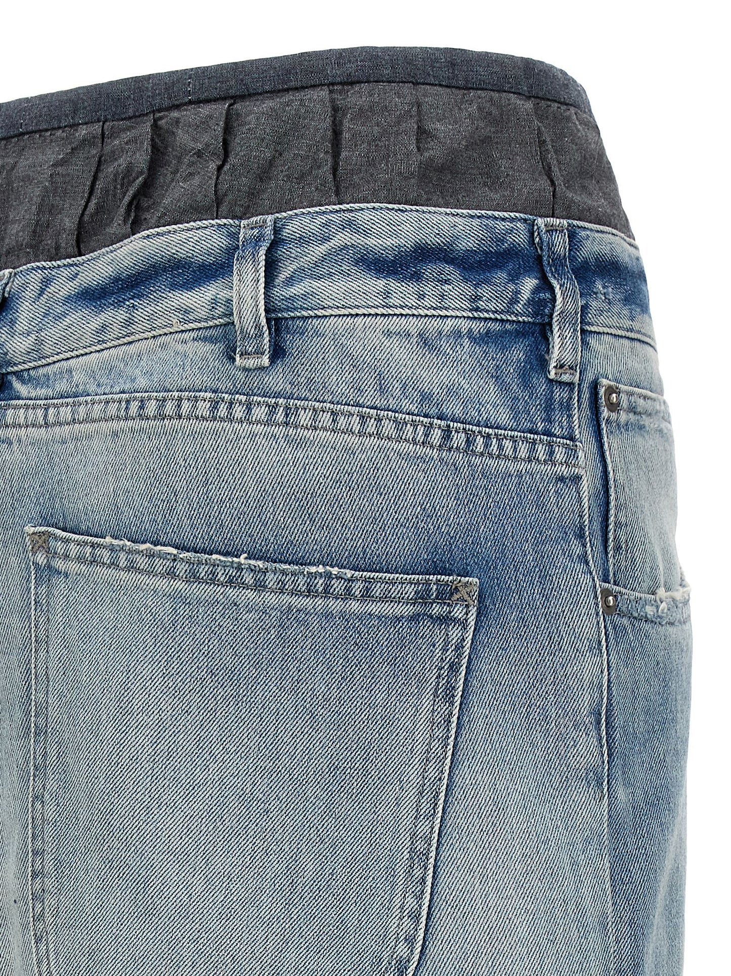 Skirt by Maison Margiela for women in denim cotton multicolor showcases a sultry silhouette, elegantly defined by its mini and the sophisticated sultry design of the Women's Denim Layered Cotton Mini Skirt.