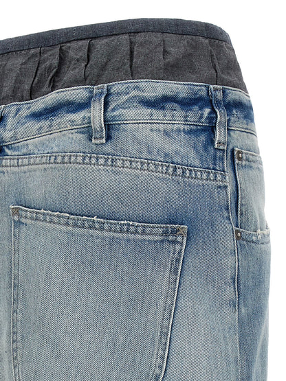 Skirt by Maison Margiela for women in denim cotton multicolor showcases a sultry silhouette, elegantly defined by its mini and the sophisticated sultry design of the Women's Denim Layered Cotton Mini Skirt.