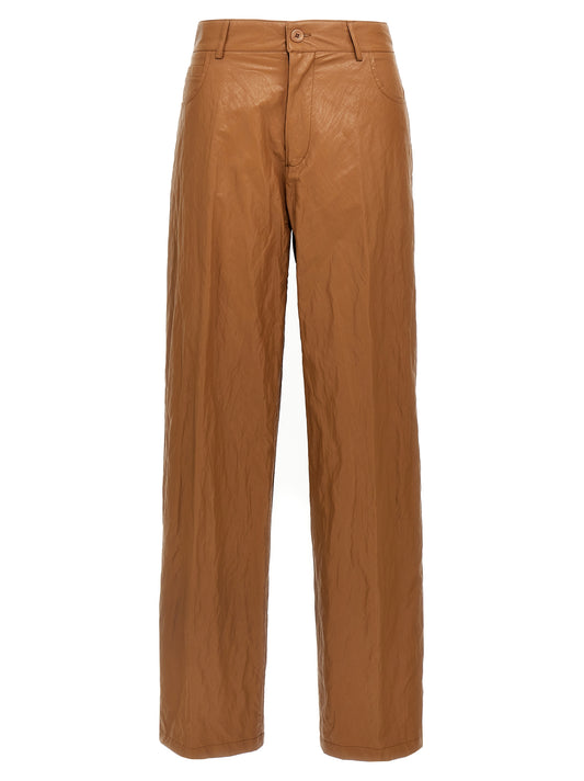 Trousers by NUDE for women in viscose polyester leather & cotton brown & nude features an sartorial silhouette, showcasing a precise straight-leg & wide and long with a sartorial for a refined look.