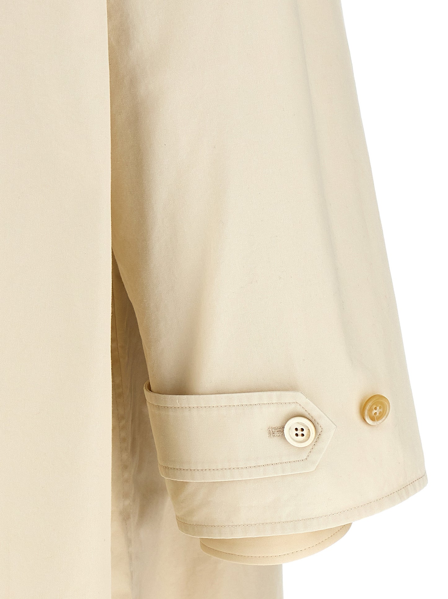 Trench Coat by Maison Margiela for men in cotton and beige presents a exquisite silhouette, showcasing a exquisite and functional pockets for an elevated aesthetic.
