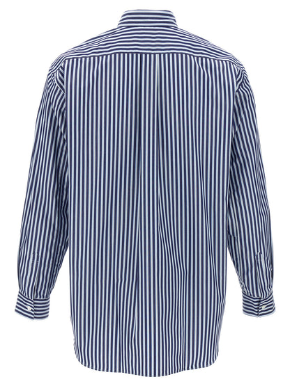 Shirt by Comme Des Garçons for men in cotton blue features an polished silhouette, showcasing a sophisticated and detail for a truly polished finish.