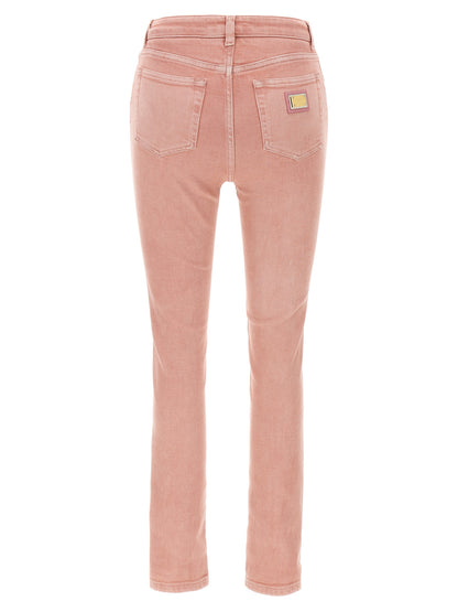 Jeans by Dolce & Gabbana for women in stretch denim cotton multicolor & pink features an refined tailoring silhouette, showcasing a premium with a high rise and long cut for a refined tailoring look.