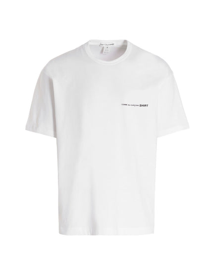 T-Shirt by Comme Des Garçons for men in cotton white features an edgy silhouette, meticulously detailed with a sophisticated short-sleeve and crew neckline for a truly edgy finish.