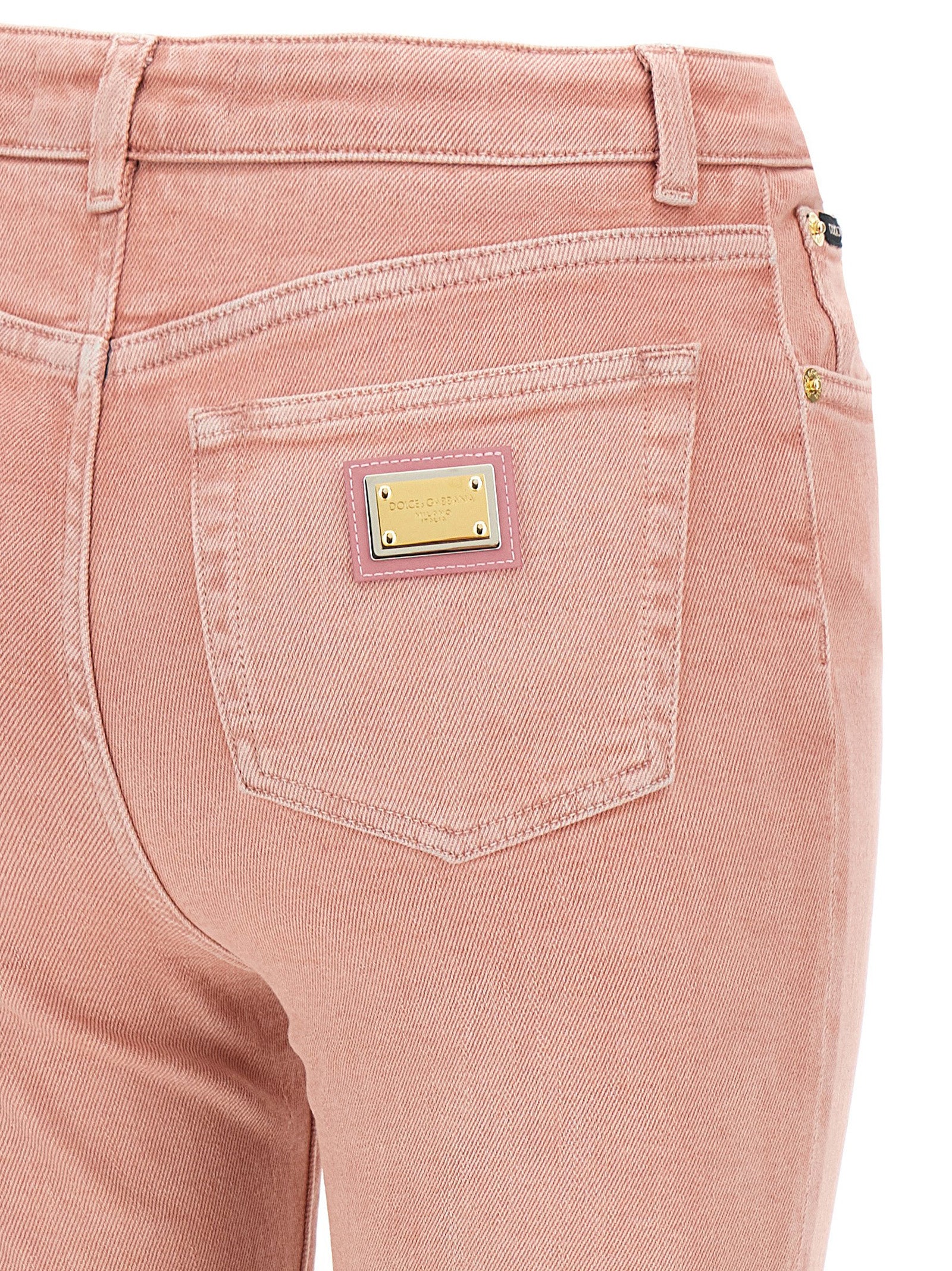 Jeans by Dolce & Gabbana for women in stretch denim cotton multicolor & pink features an sartorial and long with a high rise cut for a sartorial finish.