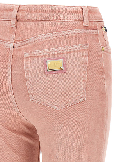 Jeans by Dolce & Gabbana for women in stretch denim cotton multicolor & pink features an sartorial and long with a high rise cut for a sartorial finish.