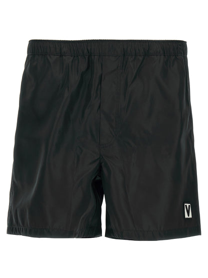 Swim Shorts by Valentino Garavani for men in nylon & mesh black features a riviera-ready silhouette, showcasing the Heart Men's Nylon & Mesh Swim Shorts design for a premium look.