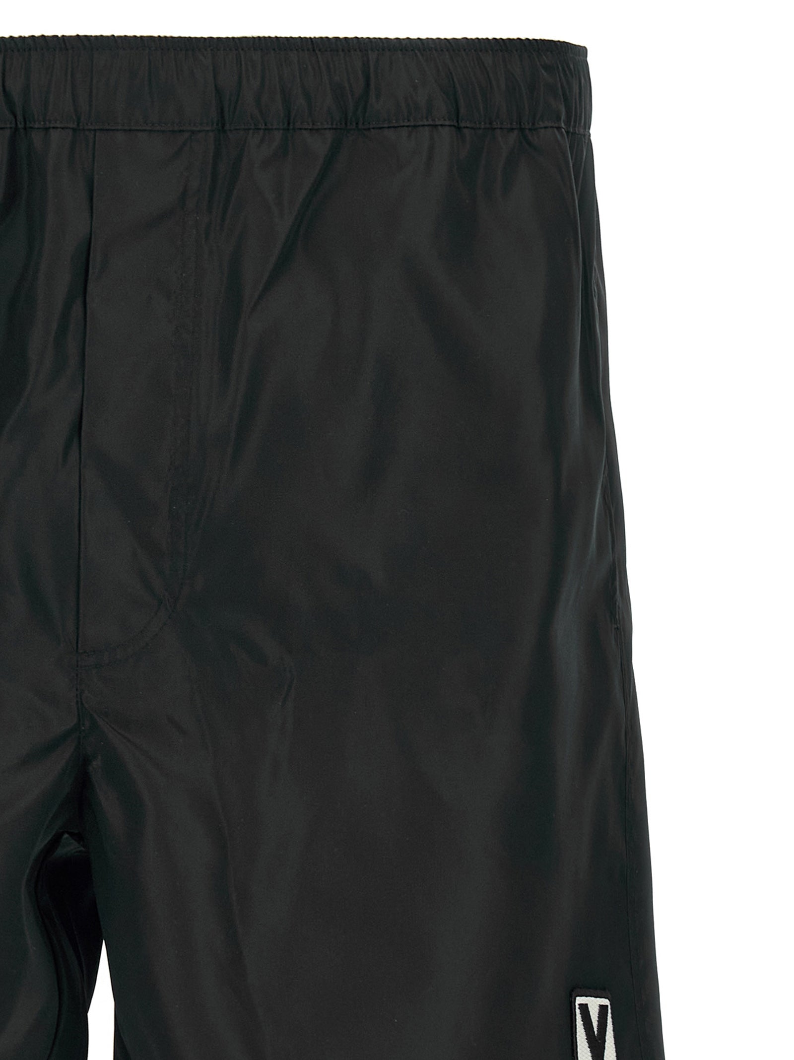 Swim Shorts by Valentino Garavani for men in nylon & mesh black features a refined silhouette, showcasing the premium design of this Heart Men's Nylon & Mesh Swim Shorts.