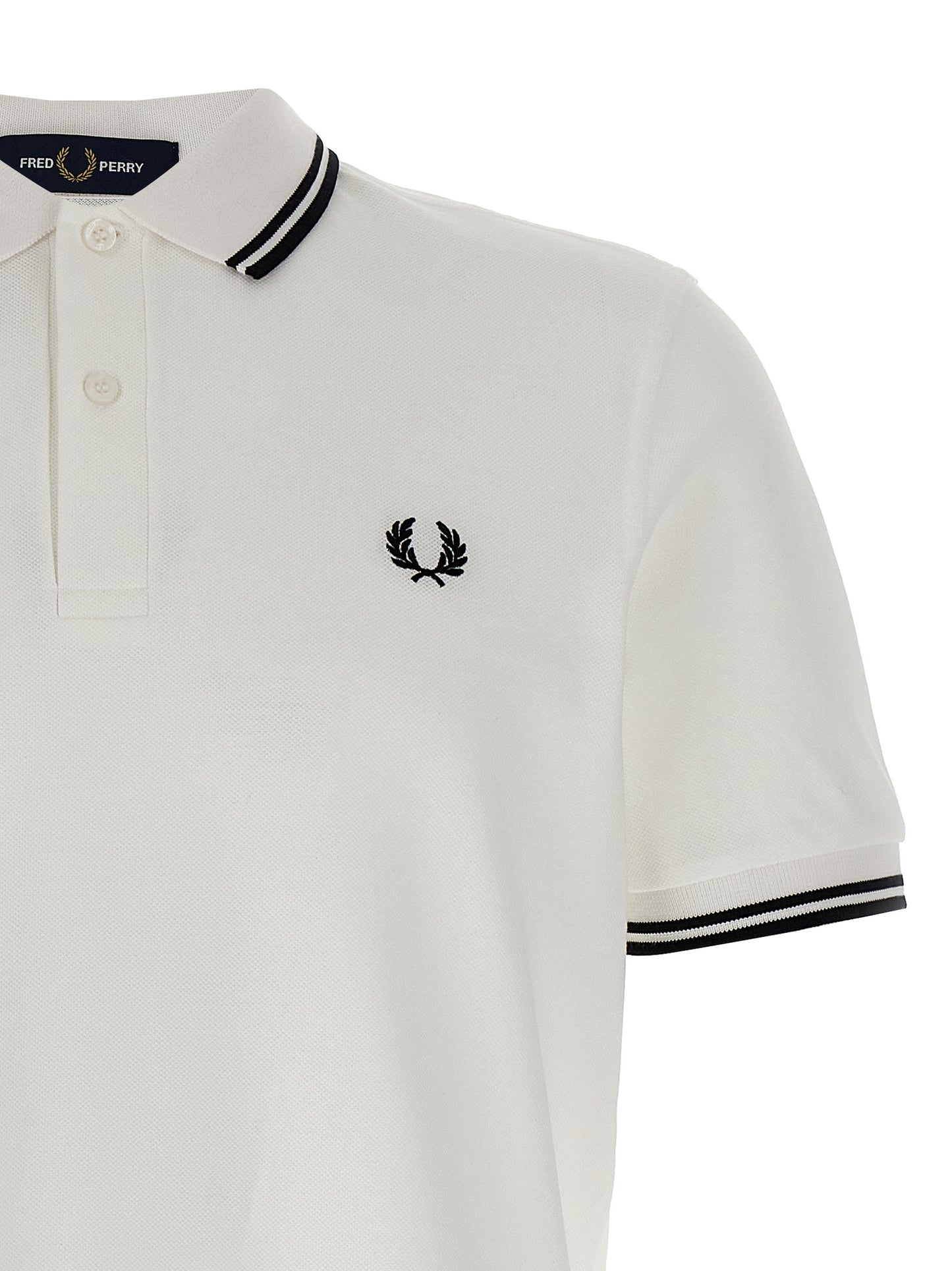 Polo Shirt by Comme Des Garçons for men in cotton white & print presents a distinguished silhouette, showcasing a sophisticated and distinguished for a truly distinguished finish.