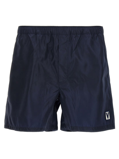 Swim Shorts by Valentino Garavani for men in nylon & mesh blue features a magnificent design, channeling the luxury vibe of Men's Nylon & Mesh Swim Shorts.