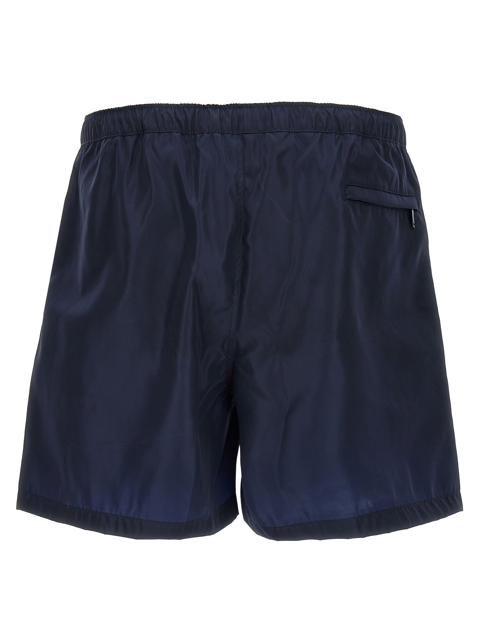 Swim Shorts from Valentino Garavani for men in nylon & mesh blue features an sleek silhouette, showcasing the distinct style of the Men's Nylon & Mesh Swim Shorts collection.