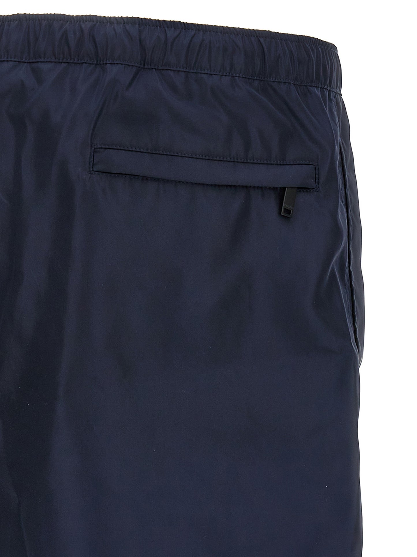 Swim Shorts by Valentino Garavani for men in nylon & mesh blue features a riviera-ready silhouette, showcasing the Men's Nylon & Mesh Swim Shorts design for a premium look.