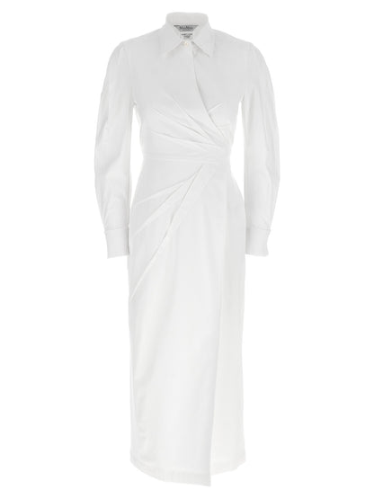 Dress by Max Mara for women in stretch cotton twill white features an magnificent silhouette, artfully detailed with a magnificent and long-sleeve that flows into an magnificent maxi long.