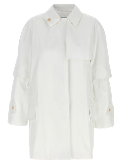 Trench Coat by Max Mara for women in cotton white showcases a contemporary silhouette, detailed with a contemporary shirt-collar neckline and distinctive water-resistant & pockets for a truly contemporary finish.