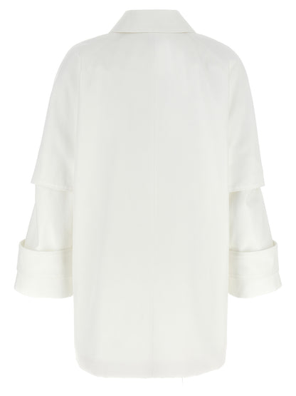 Trench Coat by Max Mara for women in cotton white presents a distinguished silhouette, artfully detailed with water-resistant & pockets and a distinguished shirt-collar neckline for a sophisticated, distinguished finish.