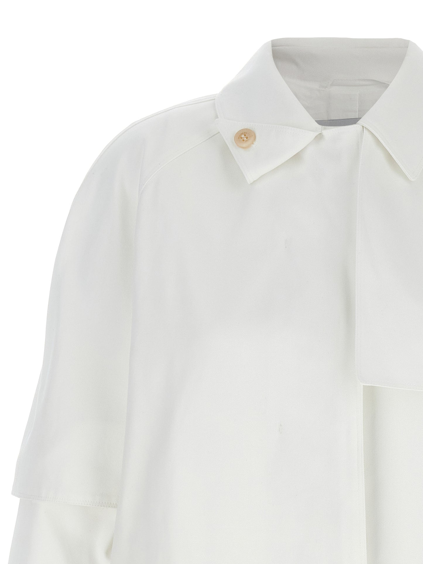 Trench Coat by Max Mara for women in cotton and white presents a exquisite silhouette, showcasing a exquisite shirt-collar neckline and functional water-resistant & pockets for an elevated aesthetic.